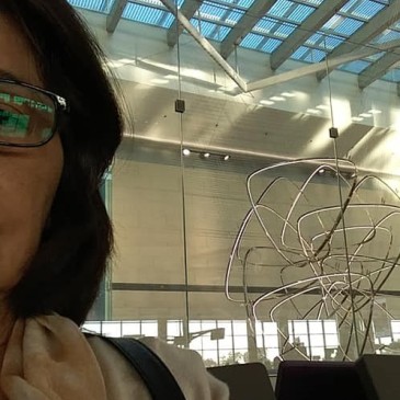 Taking a selfie before one of the stunning kinetic art installations at Changi Airport's Terminal 4 while waiting for my son to fetch me